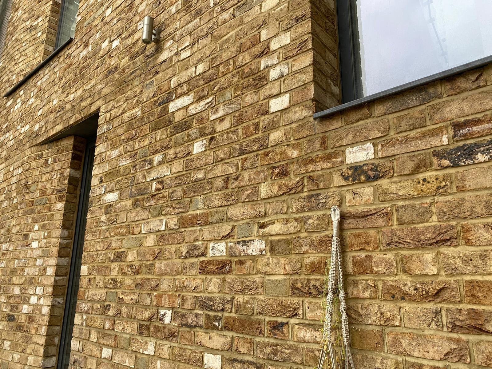 Close-up of handmade brick finish on new home extension by KDB Home Solutions, South East London