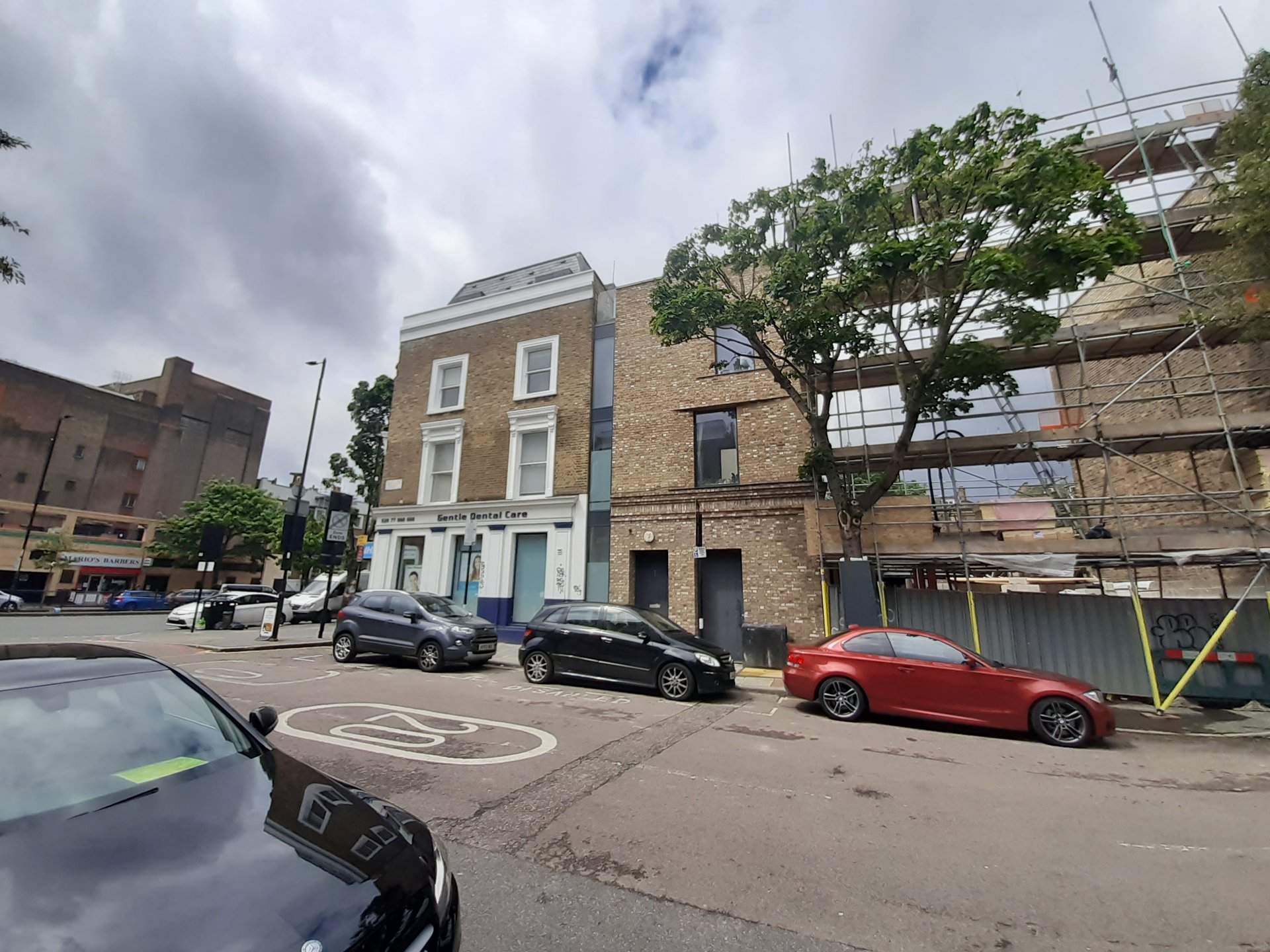 Multi-storey commercial extension during construction phase in South East London by KDB Home Solutions